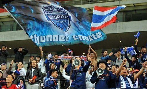 Buriram United supporters celebrate their team's AFC Champions League win in Seoul, May 1, 2013